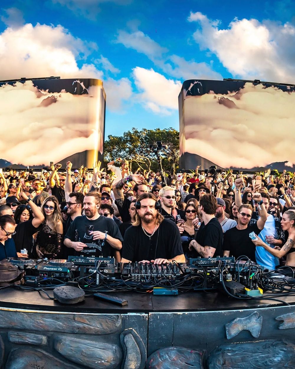 Solomun playing to a crowd in the Tulum jungle